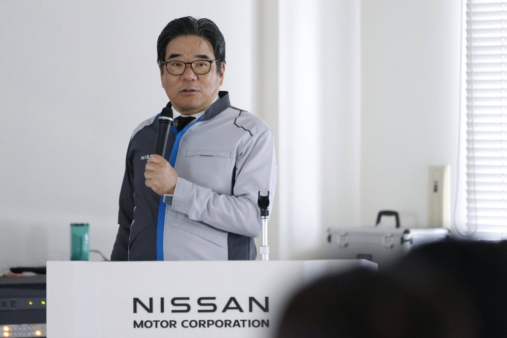 Hideyuki Sakamoto, executive vice president for manufacturing and supply chain management at Nissan, speaks during a media briefing at the company's plant in Yokohama on Tuesday.