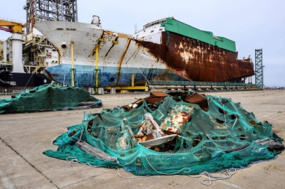 The salvaged Sewol ferry (back) on display at a port in Mokpo, South Jeolla Province on Tuesday, as South Korea marks the 10th anniversary of the country's worst-ever maritime disaster.