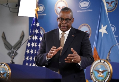 U.S. Defense Secretary Lloyd Austin speaks during a news conference at the Pentagon in Washington in May last year. Austin held talks with his Chinese counterpart on Tuesday for the first time in nearly a year and a half.