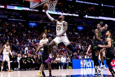 Lakers star Lebron James drives to the basket during a game against the Pelicans on Sunday. 