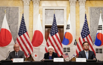 Finance Minister Shunichi Suzuki (left), U.S. Treasury Secretary Janet Yellen (center) and South Korean Finance Minister Choi Sang-mok meet on the sidelines of International Monetary Fund and Group of 20 meetings, at the U.S. Treasury in Washington on Wednesday.