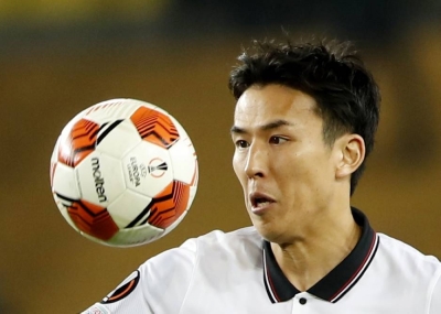 Makoto Hasebe in action during a Europa League game in December 2021
