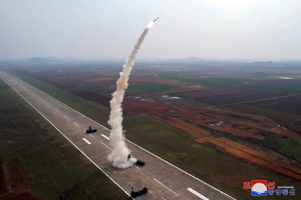 North Korea conducts a test launch of a "Pyoljji-1-2" new-type anti-aircraft missile in this photo released Saturday.  