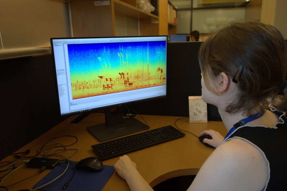 George looks at a spectogram showing birds calls, at OIST in Onna on April 4. George looks at a spectogram showing birds calls, at OIST in Onna on April 4.