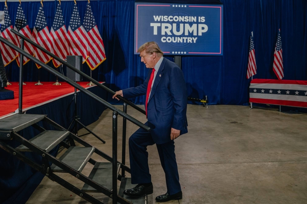 Former U.S. President Donald Trump takes the stage for a campaign event in Green Bay, Wisconsin, on April 2. 