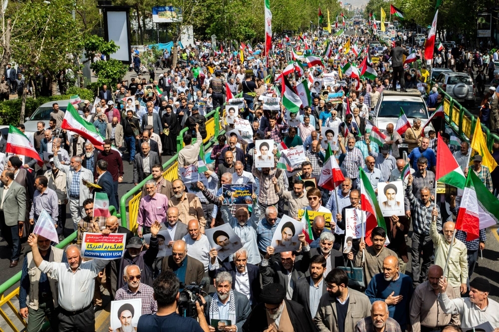 Iranians at an anti-Israeli rally after Friday prayers in Tehran. An Israeli airstrike on Iran on Friday damaged an air defense system, according to Western and Iranian officials, in an attack calculated to deliver a message that Israel could bypass Iran's defensive systems undetected and paralyze them.