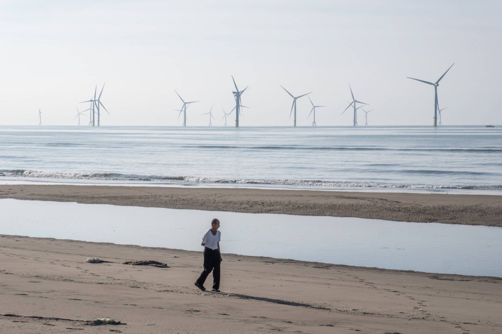 Wind turbines off the coast of Zhunan Township, Taiwan. Misguided policies threaten to sink outgoing President Tsai Ing-wen’s hopes of achieving his renewable energy targets.