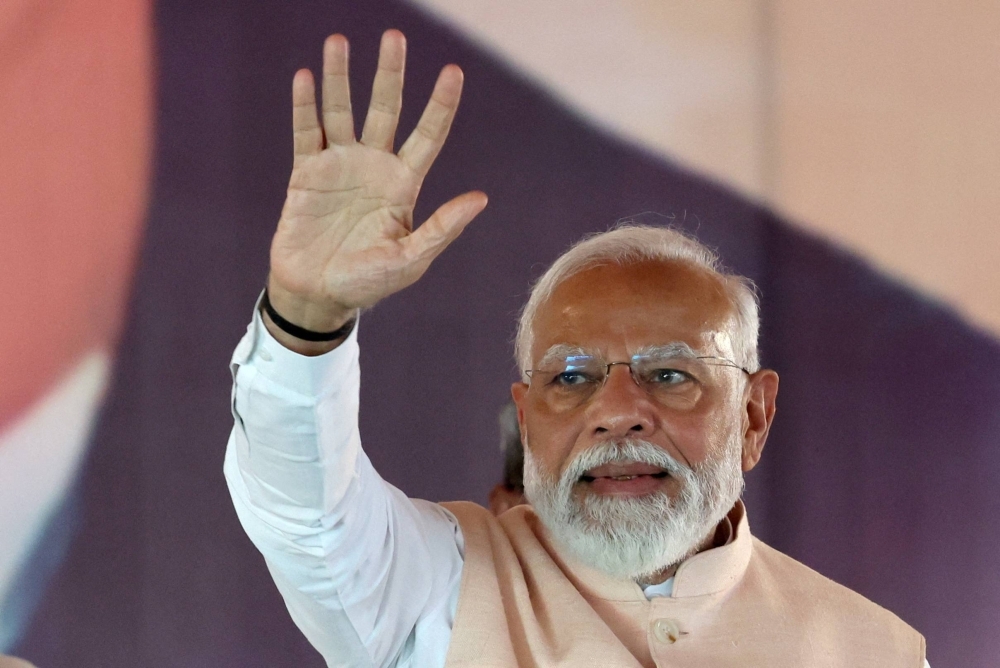 Indian Prime Minister Narendra Modi's use of divisive language himself raised alarm that it could inflame right-wing vigilantes who target Muslims, and brought up questions about what had prompted his shift in communication style.