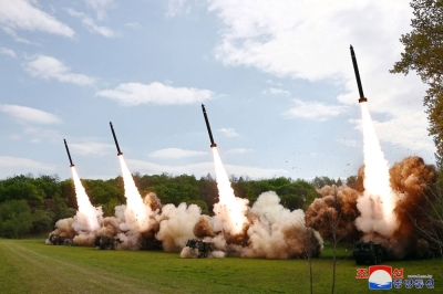 North Korean missiles are launched during a simulated nuclear counterattack drill at an undisclosed location in North Korea in this image released Tuesday.