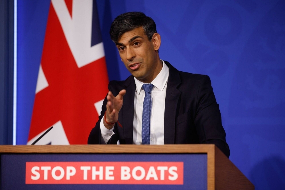 U.K. Prime Minster Rishi Sunak speaks during a news conference on his flagship Rwanda migration policy in London on Monday.