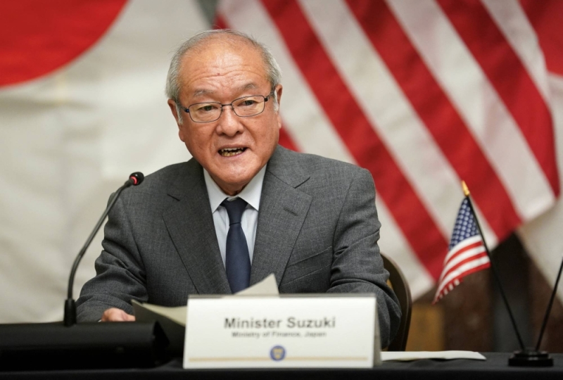 Finance Minister Shunichi Suzuki speaks during a meeting with U.S. Treasury Secretary Janet Yellen and South Korean Finance Minister Choi Sang-mok on the sidelines of IMF and G20 meetings in Washington last week.