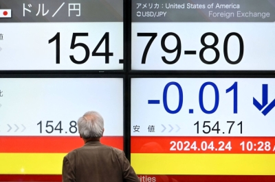 An electronic board in Tokyo showing the yen-dollar rate on Wednesday