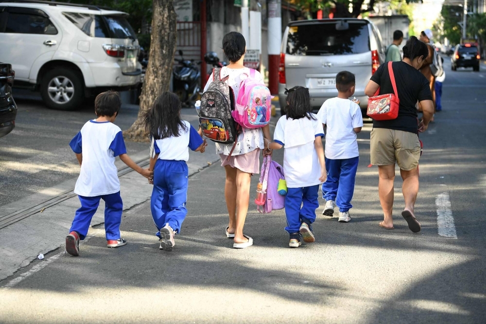 Filipino parents and children. In public schools in Metro Manila, a survey of more than 8,000 teachers last month showed 87% of students had suffered from heat-related conditions.