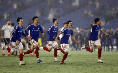 Marinos players celebrate after winning a shootout against Hyundai on Wednesday to advance to the Asian Champions League final. 