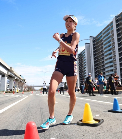 Race walker Nanako Fujii wears thick-soled shoes during a national race walking event in Kobe on Feb. 18.