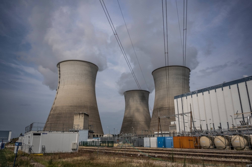 Vapor rises from cooling towers of a nuclear power station in Bugey, France. Geopolitical instability and war are putting the growth of nuclear power, a key clean energy source to combat climate change, at risk.    