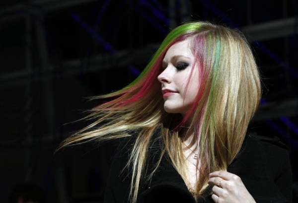 Canadian singer Avril Lavigne attends the opening ceremony of Gap Flagship Ginza in Tokyo in 2011, three years before releasing her music video for the Japan-inspired track “Hello Kitty.”