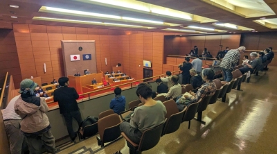 Members of the town assembly of Genkai, Saga Prefecture, on Friday deliberate a petition calling for a survey to examine the town's suitability for hosting a radioactive waste disposal site.