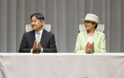 Emperor Naruhito and Empress Masako attend an event in Tokyo on Friday.