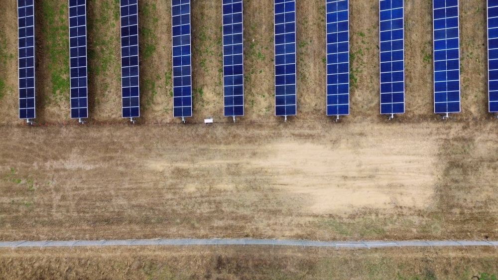Solar panels on sandy soil at Dave Duttlinger's farm in Wheatfield, Indiana