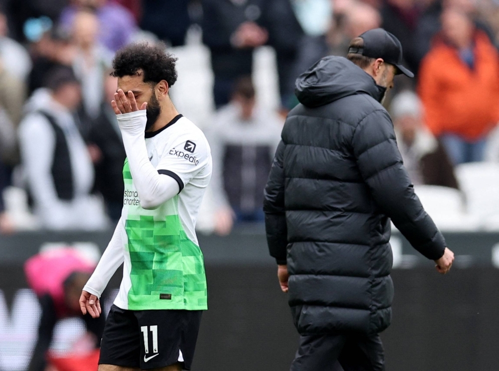 Liverpool's Mohamed Salah looks dejected after his side drew with West Ham on Saturday in London. 