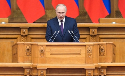 Russian President Vladimir Putin speaks during a meeting in St. Petersburg on Friday.