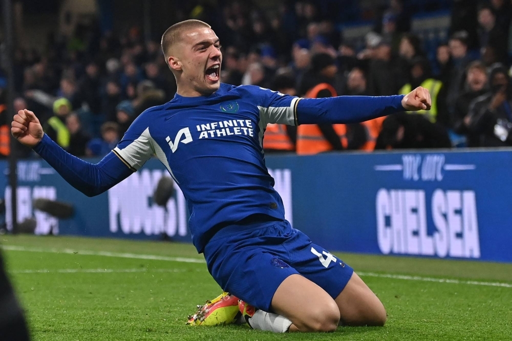 Chelsea defender Alfie Gilchrist celebrates after scoring the club's sixth goal during their English Premier League football match against Everton on April 15.