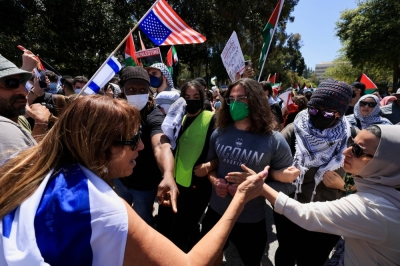 Protesters in support of Palestinians in the Gaza Strip and pro-Israel counterprotesters scuffle during demonstrations at the University of California Los Angeles on Sunday.