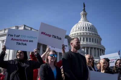Lawmakers and TikTok creators during a news conference outside the U.S. Capitol in Washington on March 12