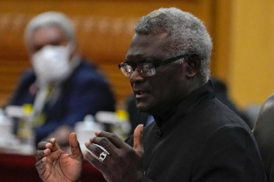 Solomon Islands' Prime Minister Manasseh Sogavare speaks during a bilateral meeting with Chinese Premier Li Qiang at the Great Hall of the People in Beijing last July.
