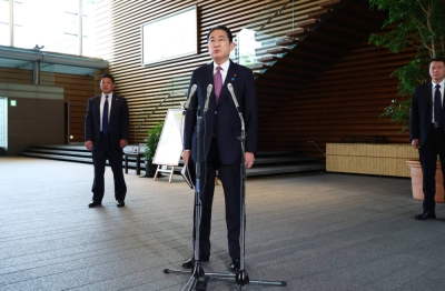 Prime Minister Fumio Kishida speaks to reporters in Tokyo on Tuesday.