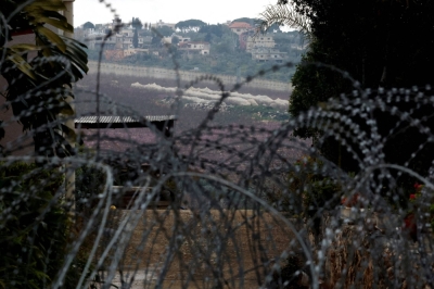 Razor wire lies near an abandoned house, amid ongoing cross-border hostilities between Hezbollah and Israeli forces, near Israel’s border with Lebanon in northern Israel on March 19.