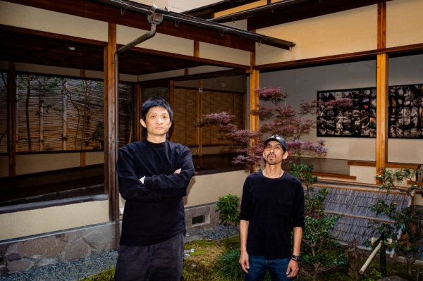 Birdhead members Ji Weiyu (left) and Song Tao, who are exhibiting “The Matrix” facing the “chikuin no ma” garden at Kondaya Genbei as part of Kyotographie 2024.