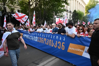 The ruling Georgian Dream Party, whose leader is pro-Russian, holds a rally in support of the government in Tbilisi on Monday.