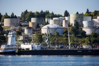 A double-hulled tanker sits docked in front of the Burnaby Refinery, near Vancouver. Natural gas is a key component of the city’s energy use.