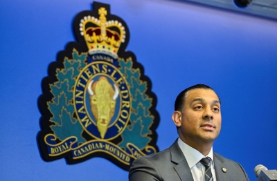 Superintendent Mandeep Mooker, officer-in-charge of the Integrated Homicide Investigation Team (IHIT), speaks at a news conference providing an update into the Hardeep Singh Nijjar homicide investigation in Surrey, British Columbia, on Friday.