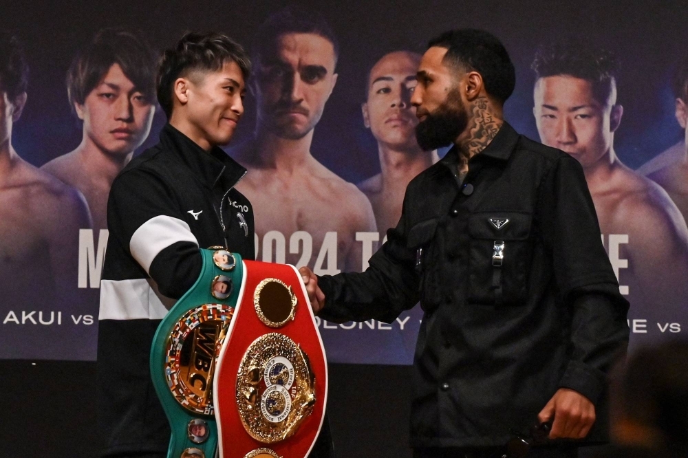 Naoya Inoue (left) and Luis Nery following a pre-fight news conference in Yokohama on Saturday, two days ahead of their super bantamweight title fight. 