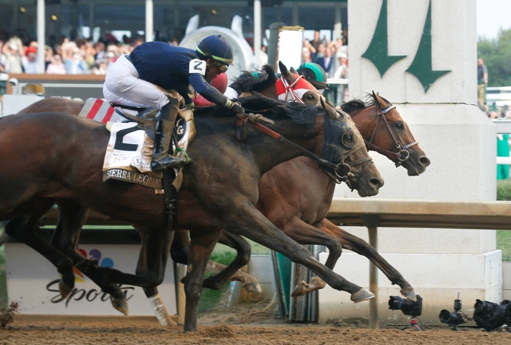 Mystic Dan (right) wins the Kentucky Derby at Churchill Downs on Saturday. 