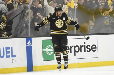 Bruins winger David Pastrnak celebrates after scoring the winning goal in overtime of Boston's Game 7 win over Toronto on Saturday. 