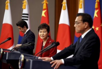 Former Chinese Premier Li Keqiang (right) speaks at a news conference with then-South Korean President Park Geun-hye and former Prime Minister Shinzo Abe after their trilateral summit at the Presidential Blue House in Seoul in November 2015.   