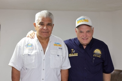 Presidential candidate Jose Raul Mulino (left) poses with ex-President Ricardo Martinelli during the general election, in Panama City in this photo released Sunday. Mulino was named the winner of Sunday's presidential election.