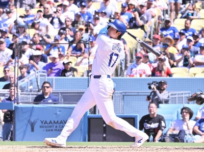 Shohei Ohtani goes deep twice in the last game of a three-game series between the Los Angeles Dodgers and Atlanta Braves at Dodger Stadium on Sunday.