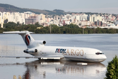 A cargo plane sits on a flooded runway at the airport in Porto Alegre, Rio Grande do Sul, Brazil, on Monday.