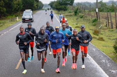 Olympic marathon champion Eliud Kipchoge (center) among his pacers during a training session in Kaptagat, Kenya, on Saturday.