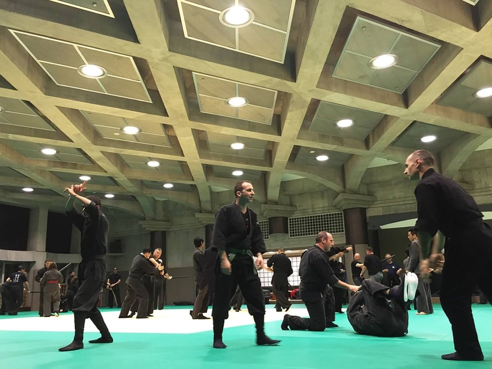 Members of the Bujinkan train at the Tokyo Budokan in Adachi Ward. Members of the Bujinkan train at the Tokyo Budokan in Adachi Ward.