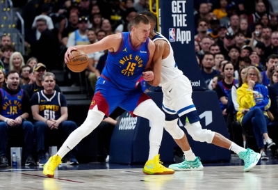 Nuggets center Nikola Jokic (left) works against the Timberwolves' Rudy Gobert during the second quarter in Game 1 of their second-round playoff series in Denver on May 4.