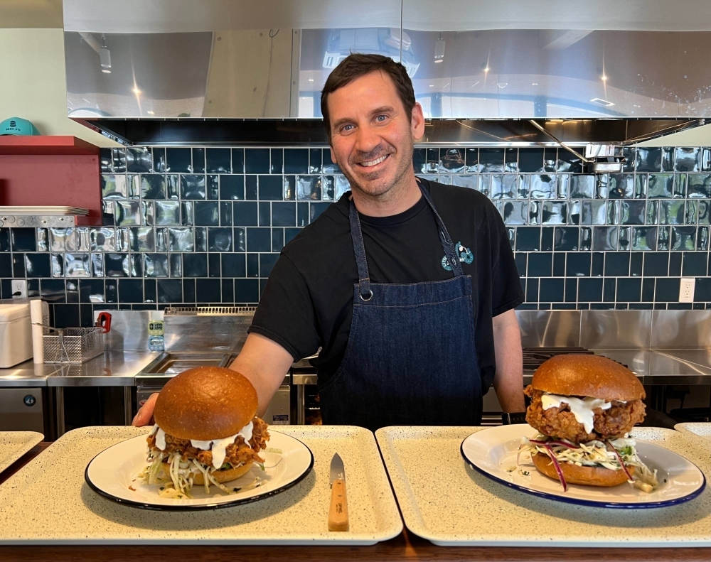 Following the success of the Parklet cafe and bakery, Jerry “JJ’ Jaksich has launched his Baby J’s
line of chicken sandwiches right next to Tokyo’s Olympic stadium. Following the success of the Parklet cafe and bakery, Jerry “JJ’ Jaksich has launched his Baby J’s
line of chicken sandwiches right next to Tokyo’s Olympic stadium.