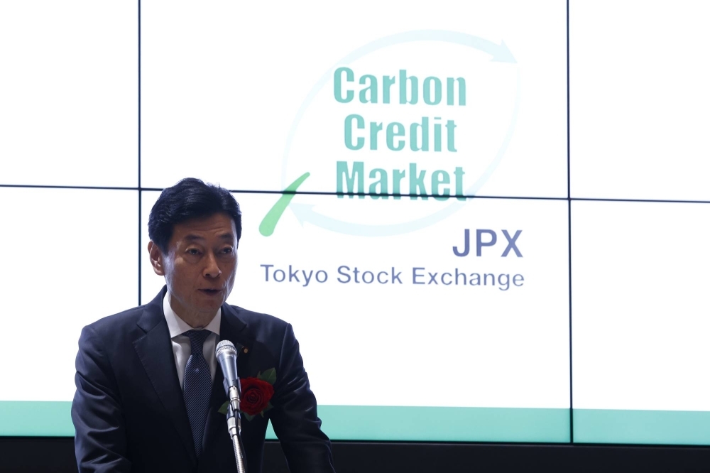 Then-trade minister Yasutoshi Nishimura speaks during a ceremony marking the opening of the carbon credit market at the Tokyo Stock Exchange in Tokyo on Oct. 11, 2023. Then-trade minister Yasutoshi Nishimura speaks during a ceremony marking the opening of the carbon credit market at the Tokyo Stock Exchange in Tokyo on Oct. 11, 2023.