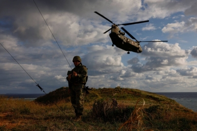 Ground Self-Defense Force troops conduct a military drill on the uninhabited island of Irisuna in Okinawa Prefecture in November. Ground Self-Defense Force troops conduct a military drill on the uninhabited island of Irisuna in Okinawa Prefecture in November.