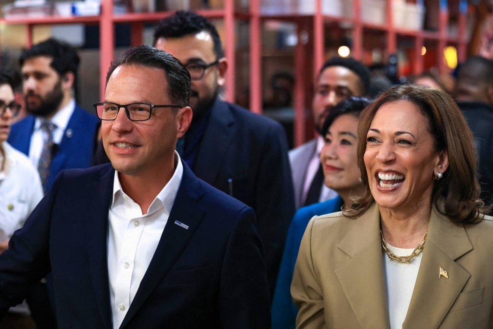 Harris and Pennsylvania Gov. Josh Shapiro react during a visit to the Reading Terminal Market in Philadelphia, Pennsylvania, on July 13. Harris and Pennsylvania Gov. Josh Shapiro react during a visit to the Reading Terminal Market in Philadelphia, Pennsylvania, on July 13.